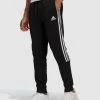 Adidas Performance Essentials Fleece Tapered Cuff 3-Stripes Pants Black / White